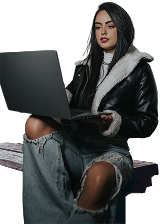 Girl sitting on bench with laptop 322x450